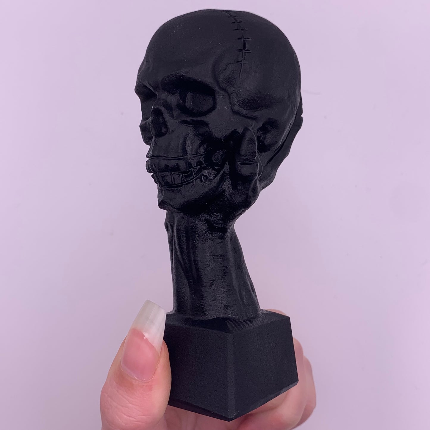 Obsidian Skull in Hand